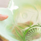 Antique Green Opalescent Bowl with Fancy Designs