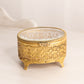 Vintage Oval Gold Tone Casket Box with Floral Designs
