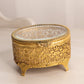 Vintage Oval Gold Tone Casket Box with Floral Designs