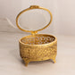 Vintage Oval Gold Tone Casket Box with Floral Designs
