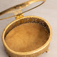 Vintage Oval Gold Tone Casket Box with Floral Designs