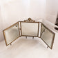 Antique Square Brass Tri-Fold Mirror with Lady, Floral & Face Details