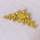 Brass Bow & Feather Wall Decor Accent