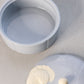 Circular Light Blue Ceramic Lidded Dish with Feather Design on Top