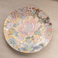Large Gold Ceramic Plate with Pink, Purple, and Green Floral Details