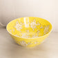 Large Yellow Ceramic Bowl with White Floral Designs