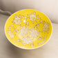 Large Yellow Ceramic Bowl with White Floral Designs