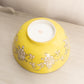 Large Yellow Ceramic Bowl with White Floral Designs
