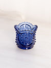 Small Blue Glass Toothpick Holder with Burst Designs and Sawtooth Edge