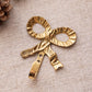 Small Brass Bow Wall Decor Hook