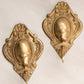 Small Brass Wall Sconces with Oval and Floral Designs (Set of 2)