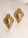 Small Brass Wall Sconces with Oval and Floral Designs (Set of 2)