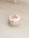 Small Circular Pink Ceramic Lidded Jar with Floral Designs