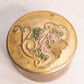 Small Gold Circular Brass Enameled Lidded Dish with Floral Design on Top