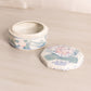 Small Hexagonal White Ceramic Lidded Jar with Pink Floral Designs