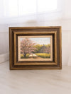 Small Horizontal Log Cabin & Pink Tree Painting with Brown Frame