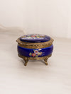 Small Oval Blue Ceramic Hinged Lidded Music Box with Floral Designs
