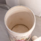 Tall Cream Ceramic Lidded Jar with Floral Designs and Gold Details