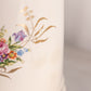 Tall Cream Ceramic Lidded Jar with Floral Designs and Gold Details