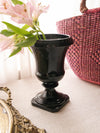 Vintage Black Glass Footed Urn Vase with Embossed Details