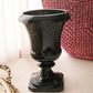 Vintage Black Glass Footed Urn Vase with Embossed Details