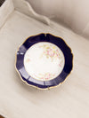 Vintage Blue Ceramic Bowl with Floral Designs and Wall Hanger