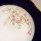 Vintage Blue Ceramic Bowl with Floral Designs and Wall Hanger