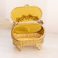 Vintage Ornate Gold Tone Angled Casket Jewelry Box with Amber Glass