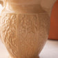 Medium Tan Ceramic Pitcher with Floral Details