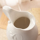 Vintage Metropolitan Museum of Art Bisque Porcelain Floral Pitcher