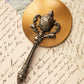 Vintage Small Handheld Mirror with Ornate Handle