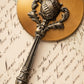 Vintage Small Handheld Mirror with Ornate Handle