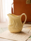 Vintage Small Yellow Pottery Pitcher with Leaf Details
